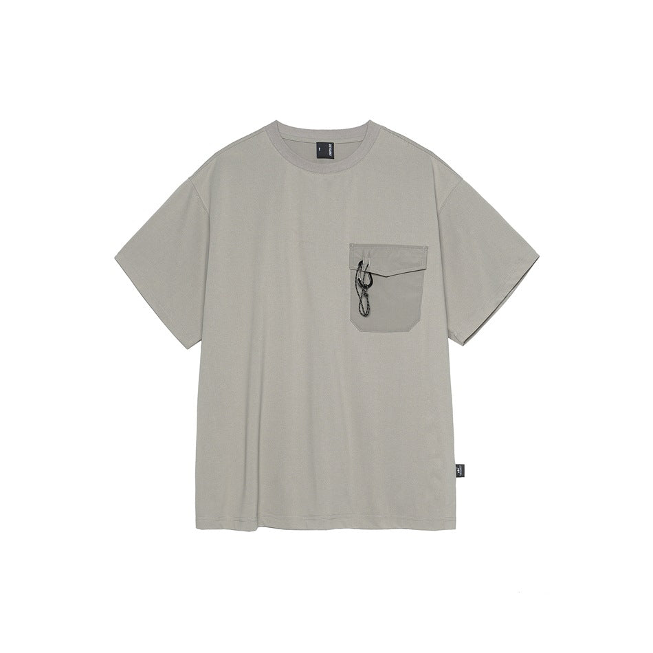 Light gray short-sleeve crew neck T-shirt with a chest flap pocket and black cord toggle, flat front view