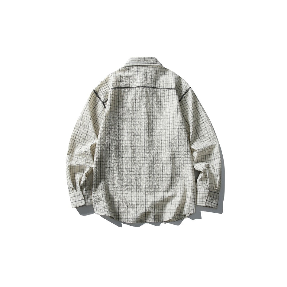 Back view of cream and dark gray check shirt with contrast stitched yoke and textured fabric, flat lay