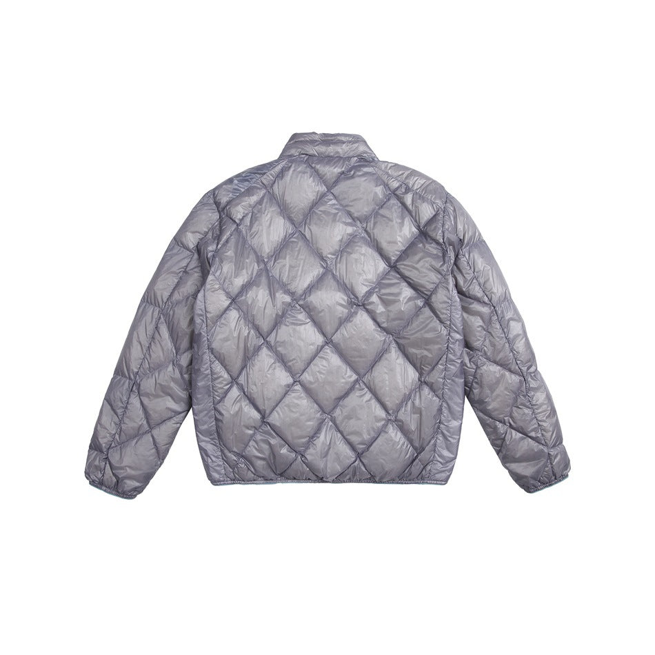 Back view of a light gray quilted jacket with diamond stitching, long sleeves and a short stand collar.