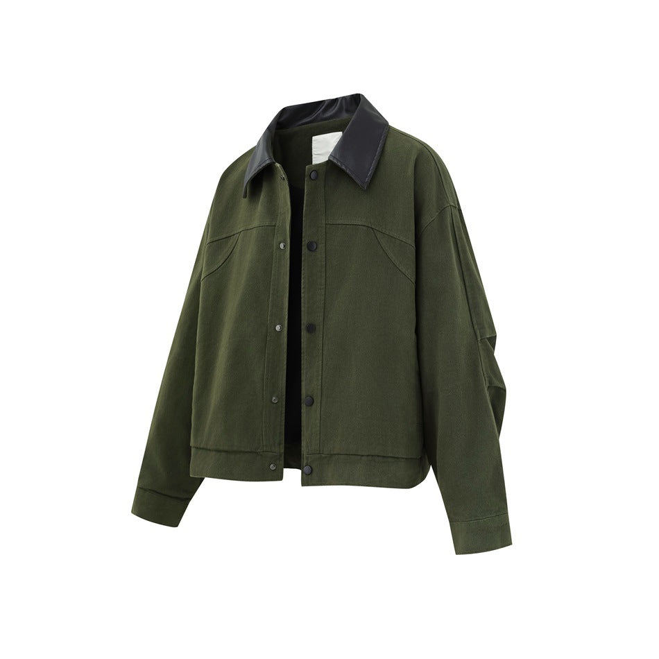 Front view of an olive green jacket with a black pointed collar, snap-button placket, chest seams, and long sleeves.