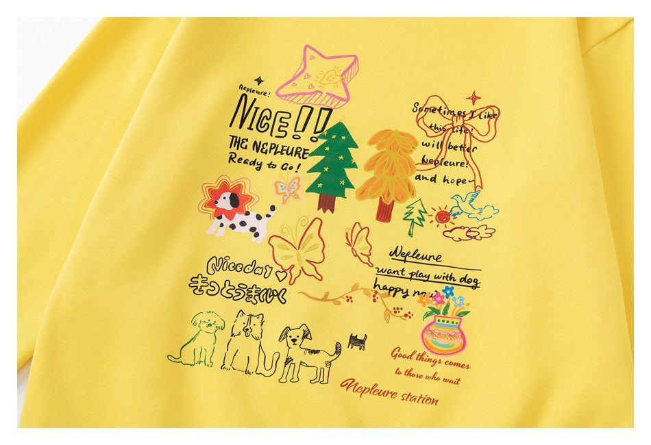 Yellow sweatshirt front with colorful hand-drawn trees, butterflies, dogs, and decorative English lettering.