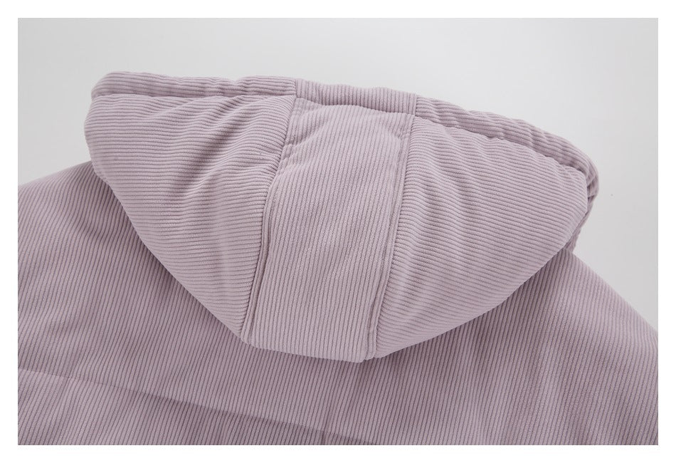 Back close-up of a pale mauve ribbed corduroy jacket hood and upper back.