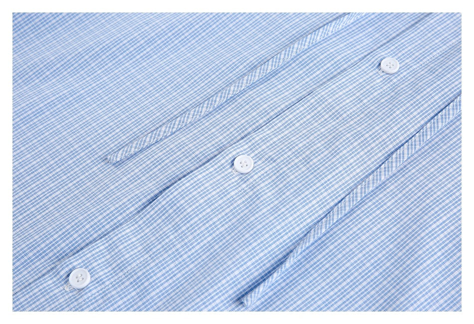 Close-up of the blue-and-white check shirt placket with white buttons and stitched edges.