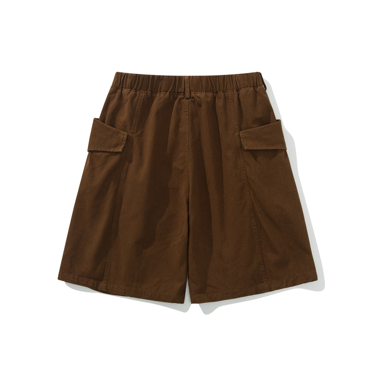 Back view of dark brown wide-leg shorts with a gathered waistband and large flap cargo pockets.