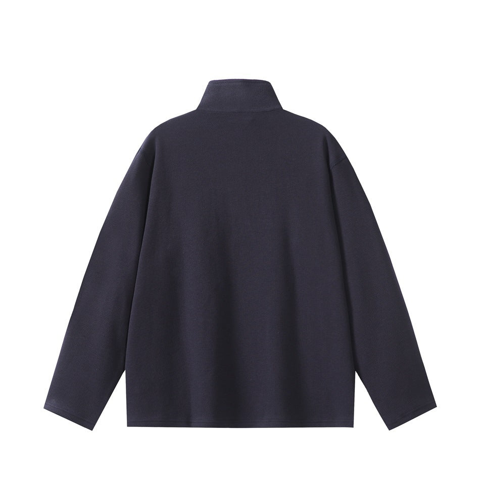 Back view of a dark navy pullover with a stand collar and long sleeves.
