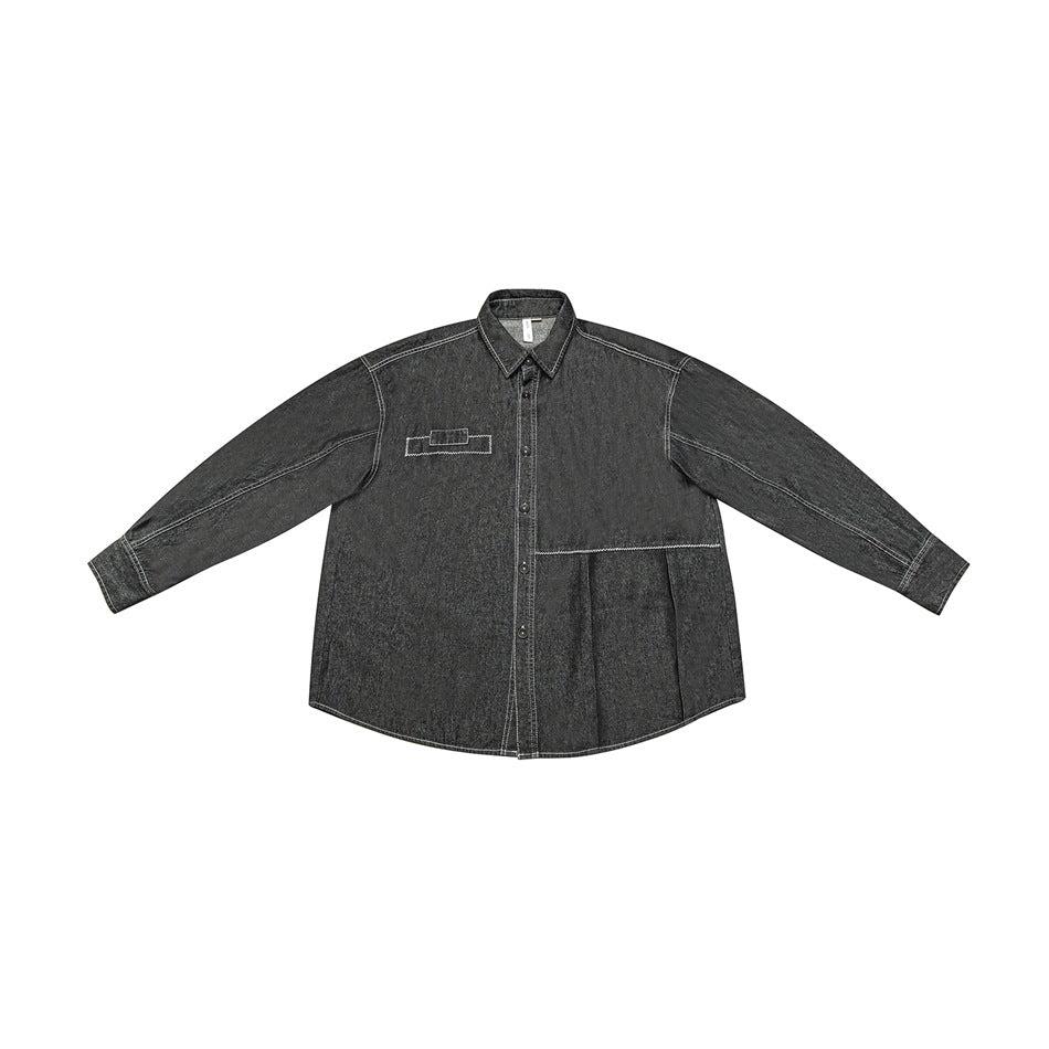 Black-gray denim-look oversized button-up shirt, flat front view with contrast stitching and pleated lower panel