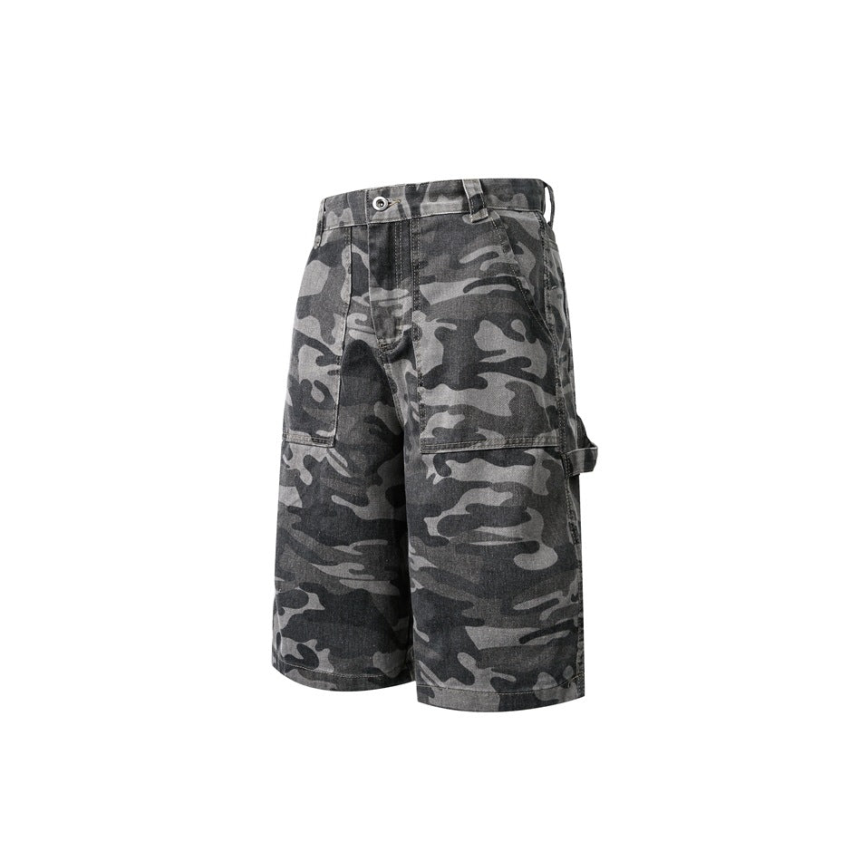 Gray and black camouflage knee-length shorts shown at an angle, with front patch pockets and a side hammer loop