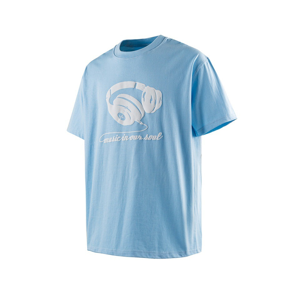 Light blue T-shirt at a three-quarter angle showing the white headphone graphic, crew neck and short sleeve