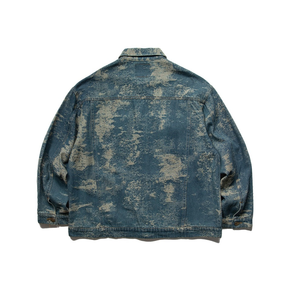 Back of blue washed denim-style jacket with tan mottled pattern, yoke seam and button cuffs