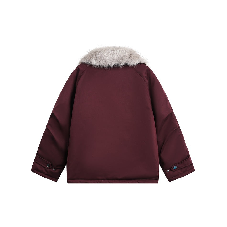 Back view of a burgundy jacket with a pale gray fur collar and buttoned cuff tabs.