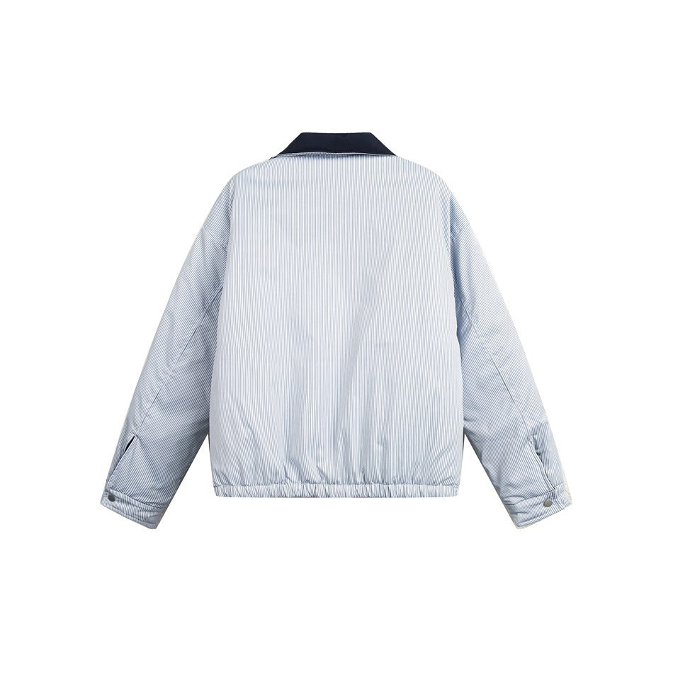 Back view of a pale blue pinstriped jacket with a navy collar, long sleeves, snap cuffs and an elasticated hem.