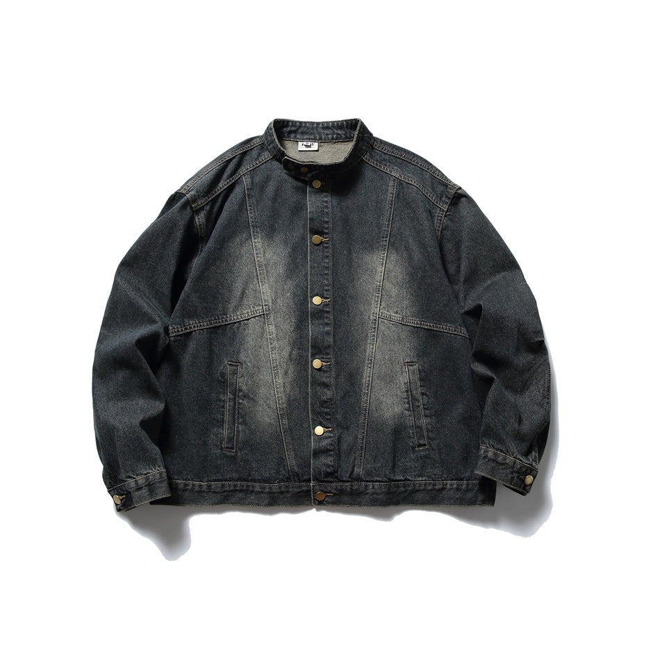 Washed black denim stand-collar jacket with gold-tone buttons, shown flat from the front