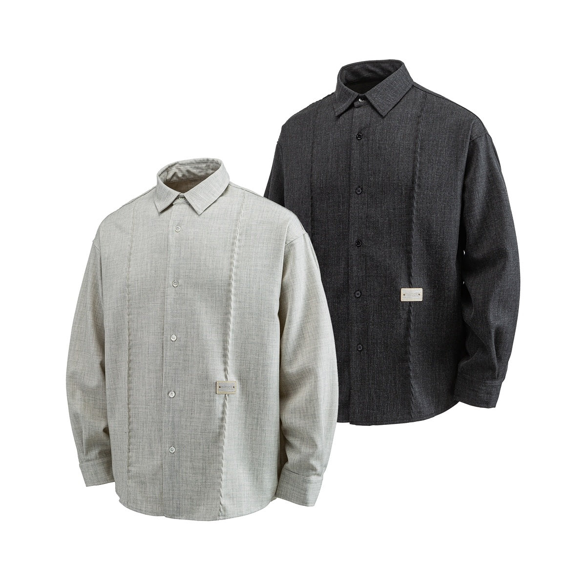 Two long-sleeve button-up shirts with pointed collars, one light gray and one charcoal, shown from the front.