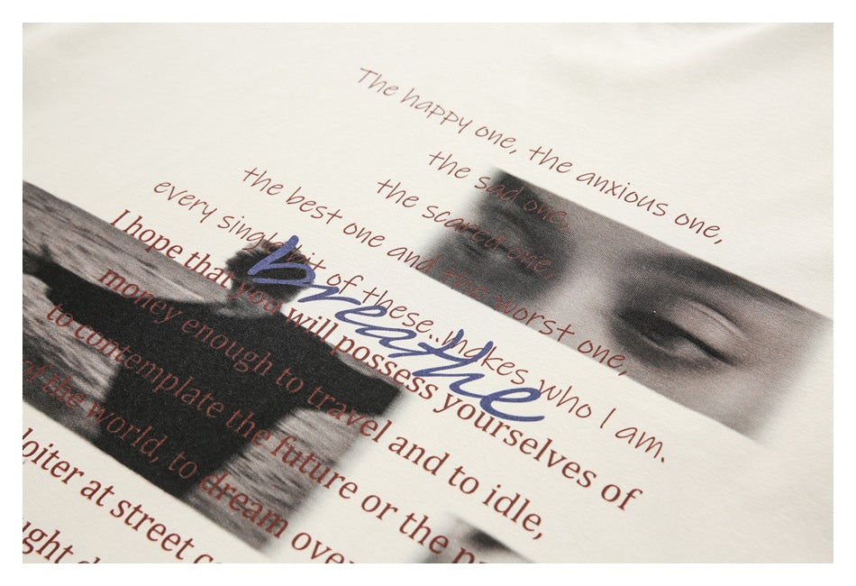 Close-up of a cream garment with brown English text and grayscale face images printed on it.