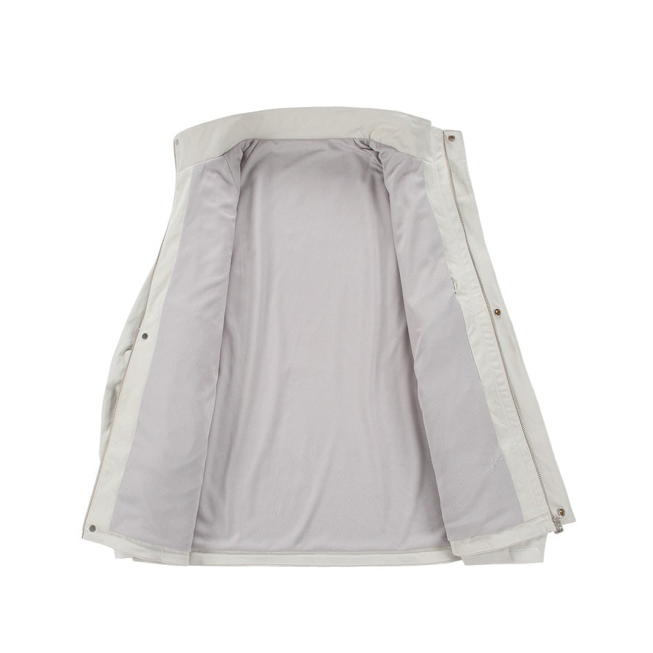 Open ivory jacket laid flat, showing its pale gray mesh lining, zipper, and snap fasteners.