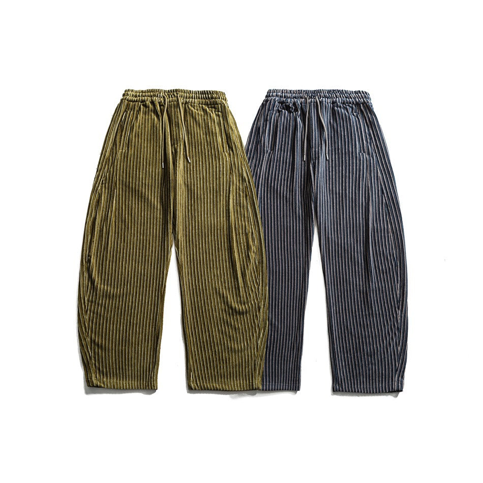 Front flat lay of relaxed striped pants in olive and charcoal, with elastic waistbands and drawstrings.