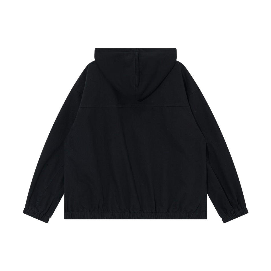 Black hooded jacket back view with yoke seam, hood and elastic hem and cuffs, flat lay