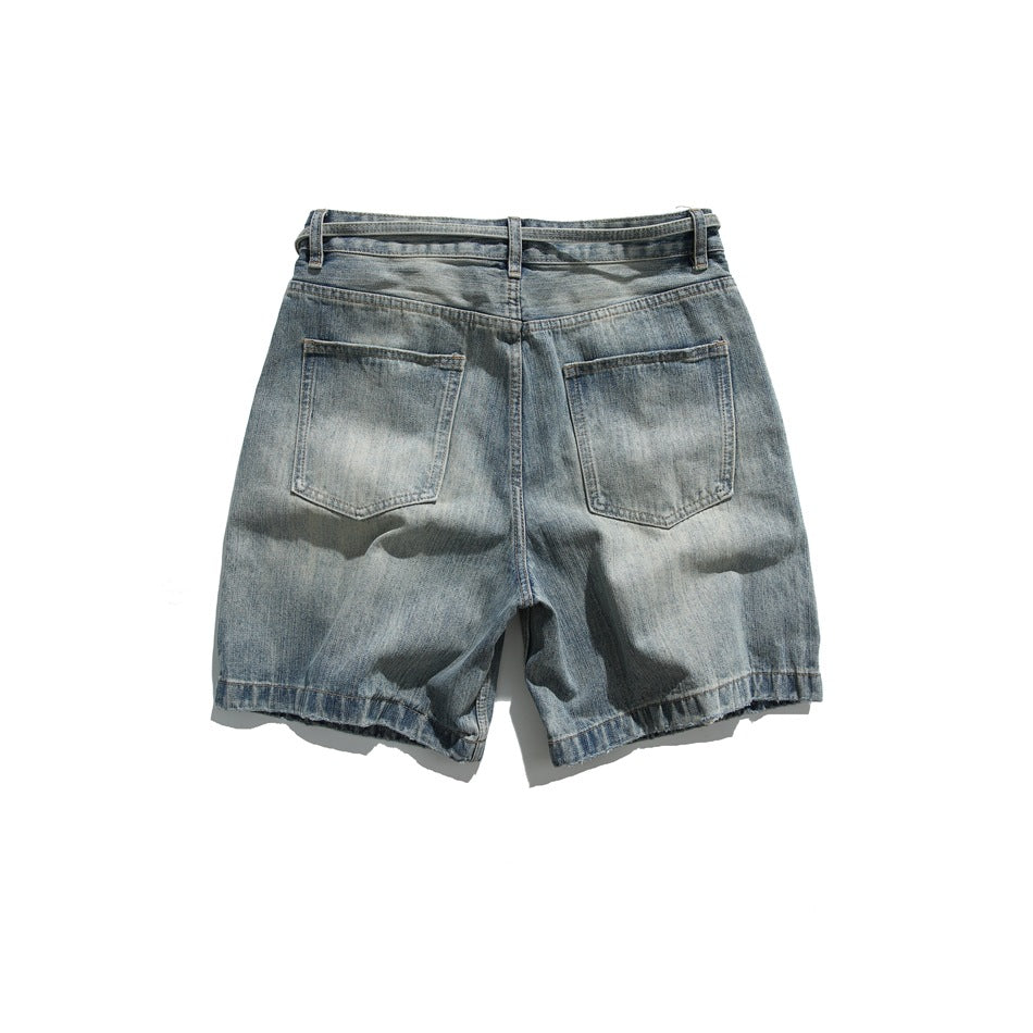 Back view of faded blue denim shorts with two patch pockets and belt loops on a flat lay