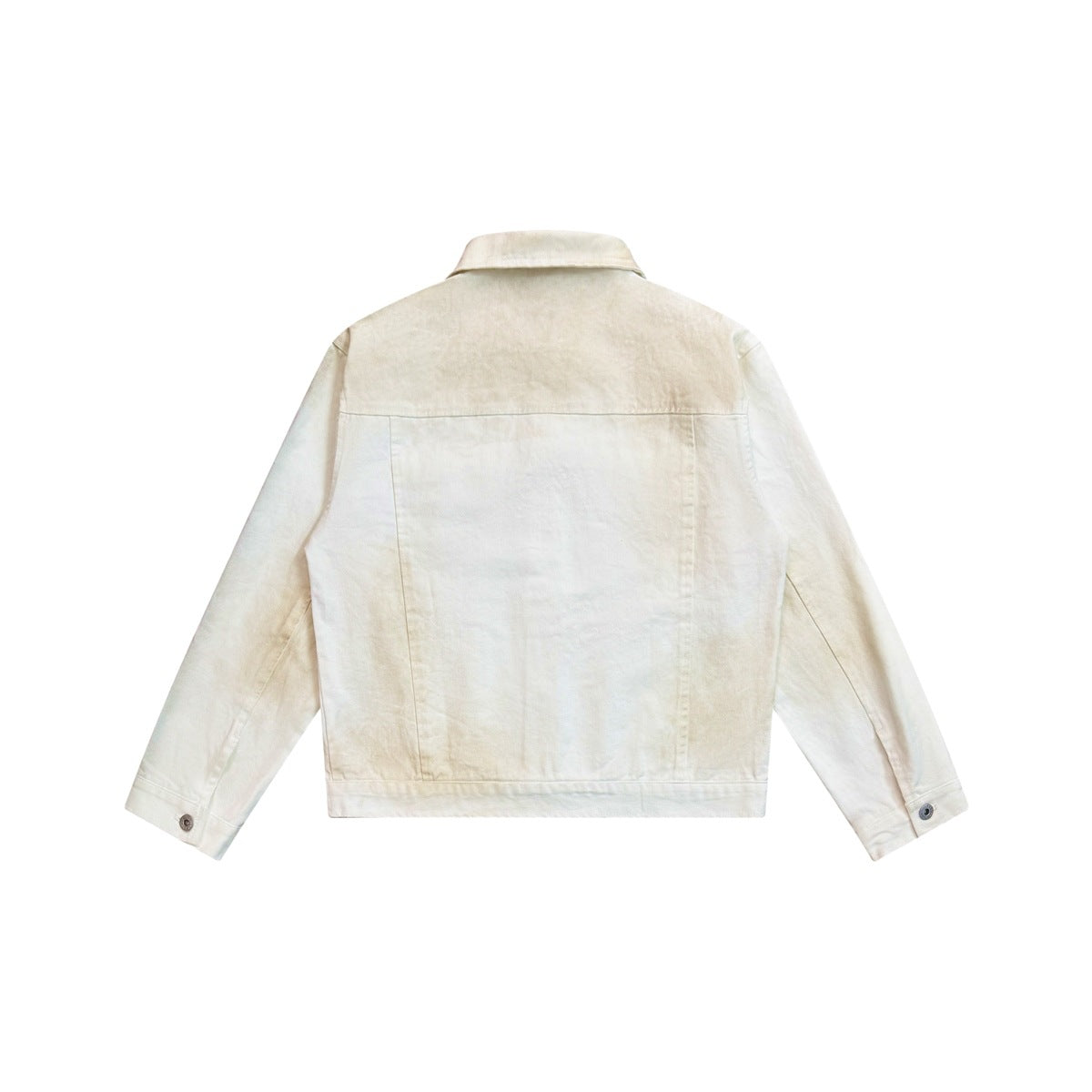 Back view of mud-dyed white jacket with yoke seam, paneled back and button cuffs, flat lay