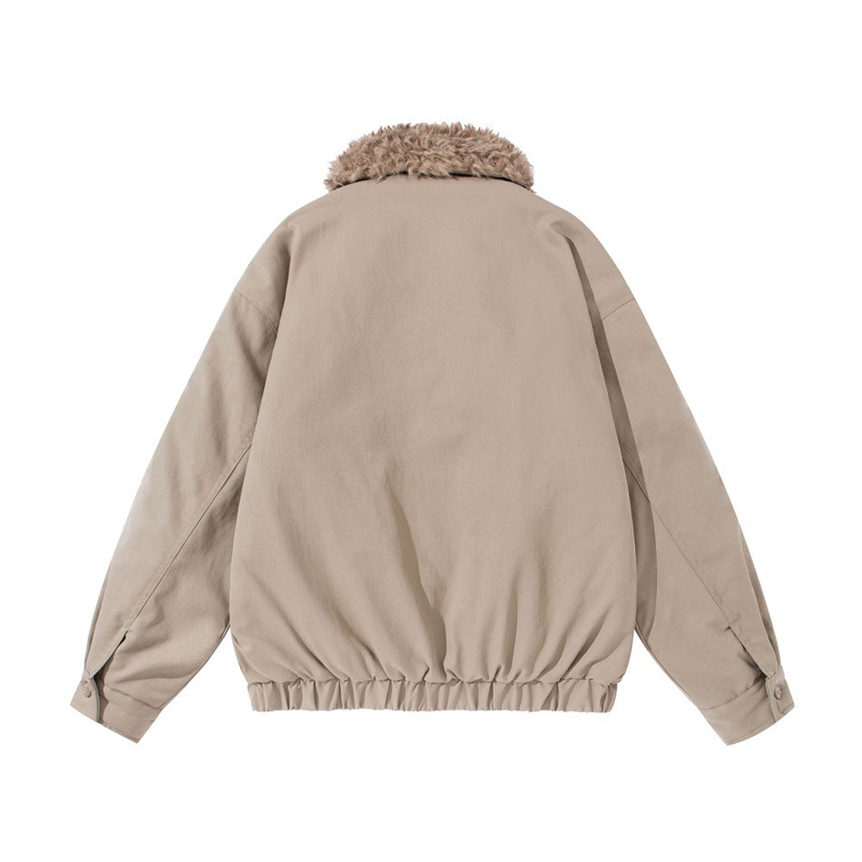 Back view of a light beige jacket with a shaggy tan collar, long sleeves, and gathered hem.