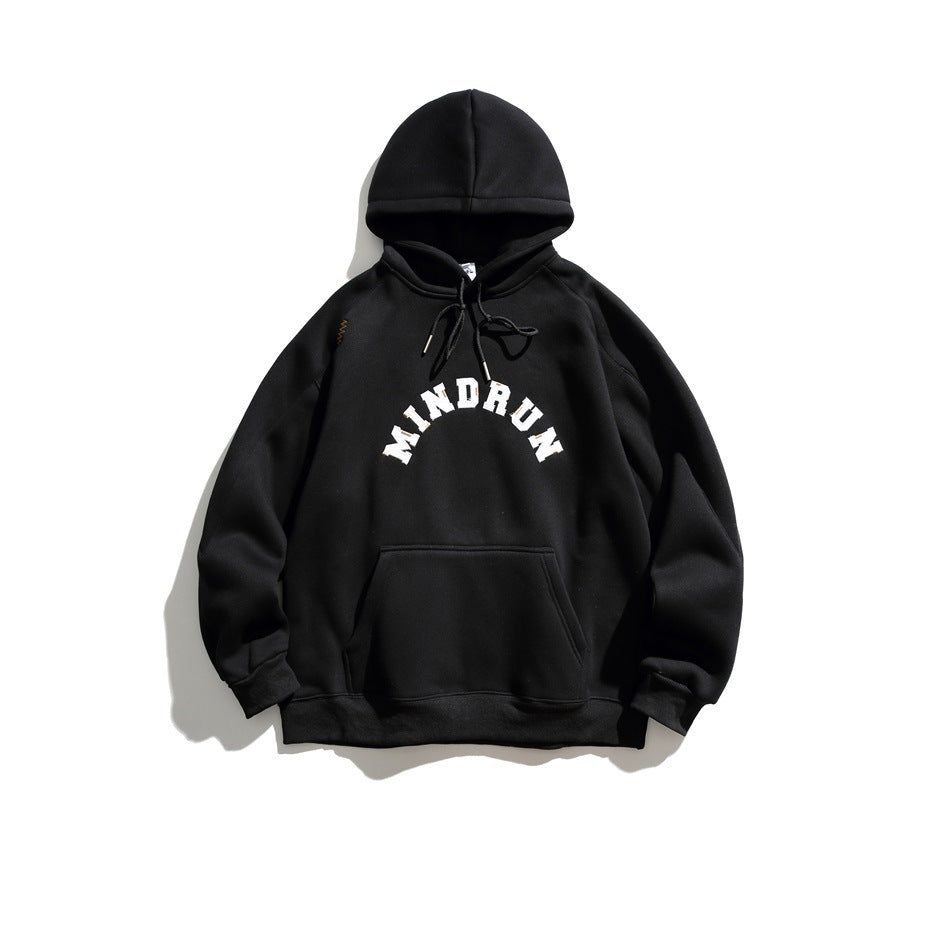 Black pullover hoodie flat lay with white arched MINDRUN lettering, drawstrings and front pouch pocket