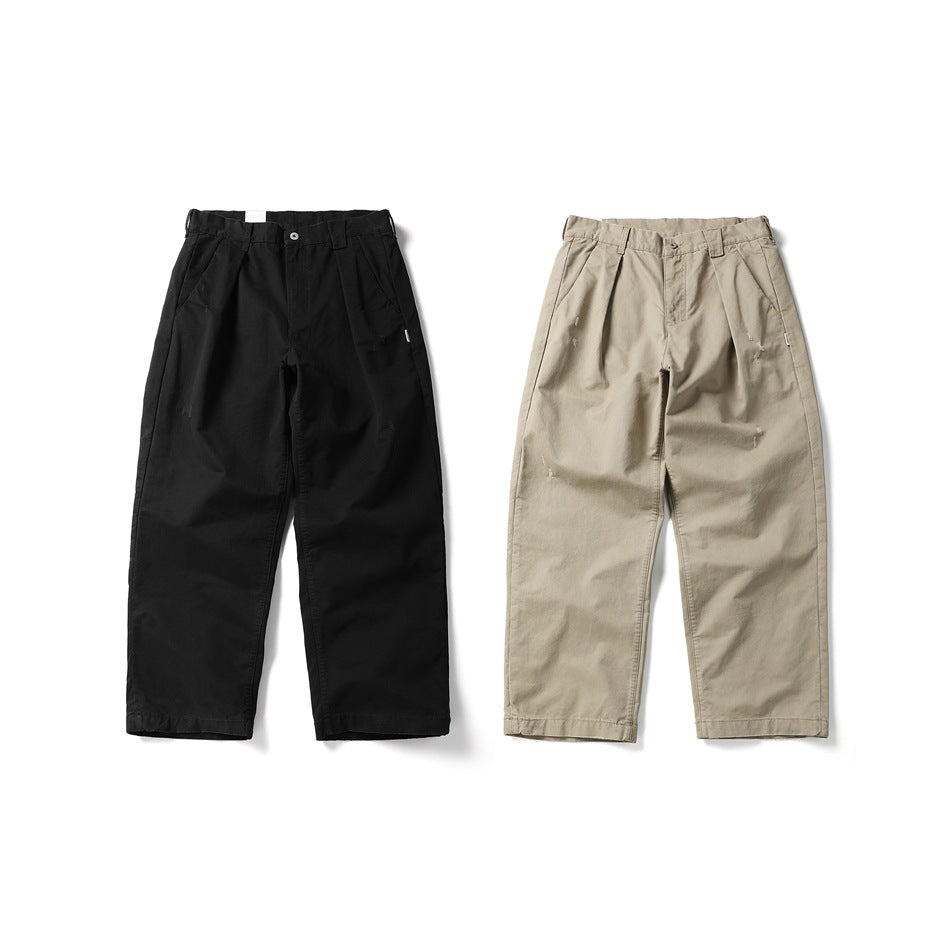 Front view of wide-leg pleated trousers shown in black and beige.