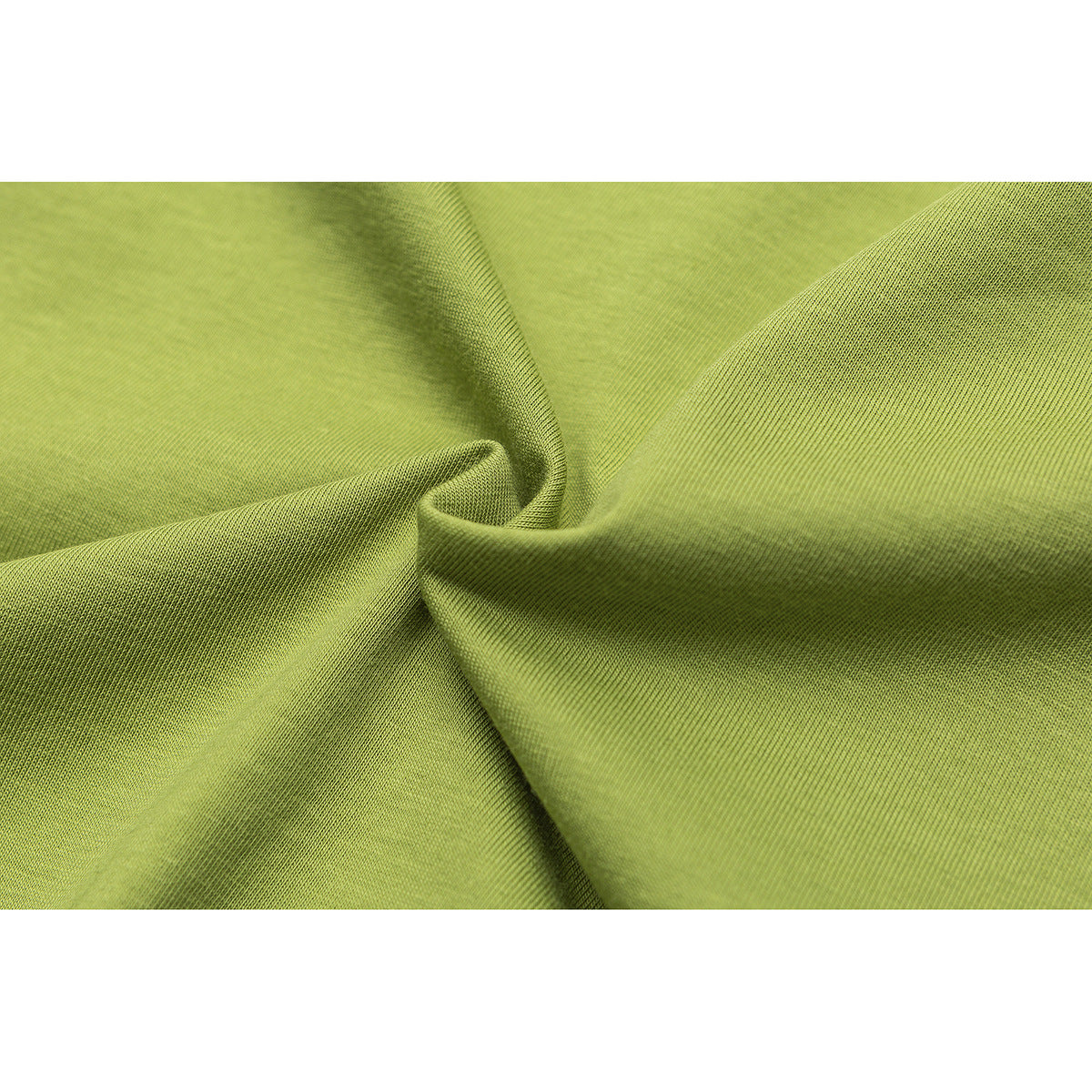 Macro view of lime-green knit fabric draped into folds.