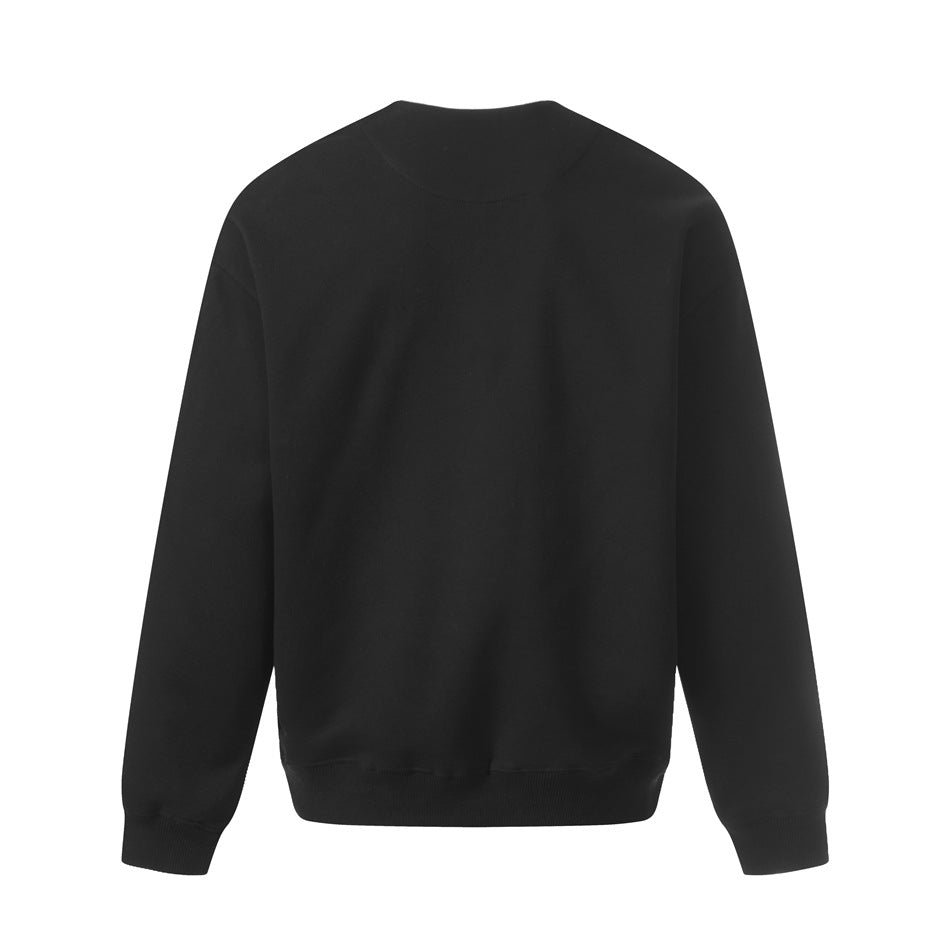 Back view of a black long-sleeve top with a round neckline and ribbed cuffs and hem.