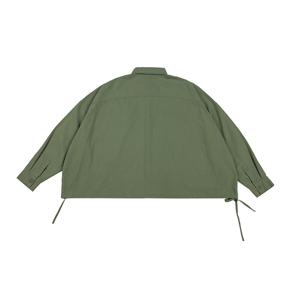 Back view of a loose olive-green collared jacket with long sleeves, button cuffs and adjustable hem ties.