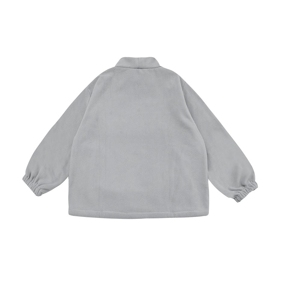Rear view of a light gray jacket with a raised collar, long sleeves, and elastic cuffs, shown flat.