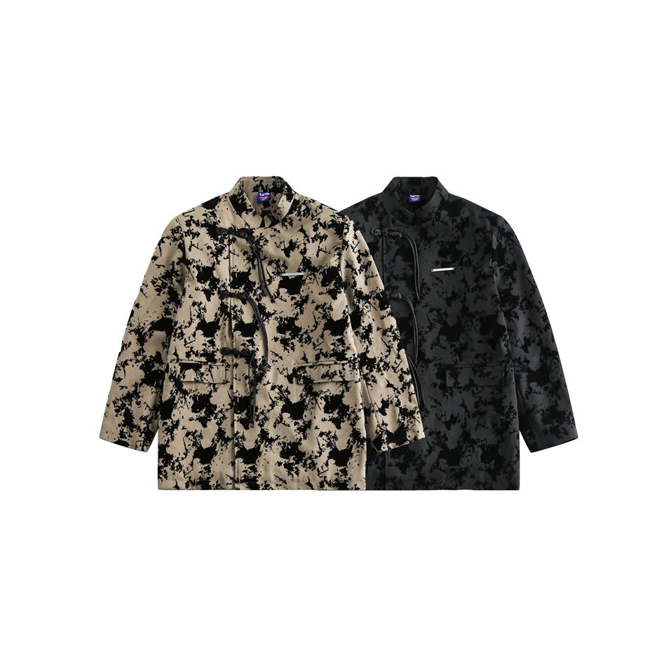 Two jackets shown together: one tan with a black abstract pattern and one black with a dark gray pattern.