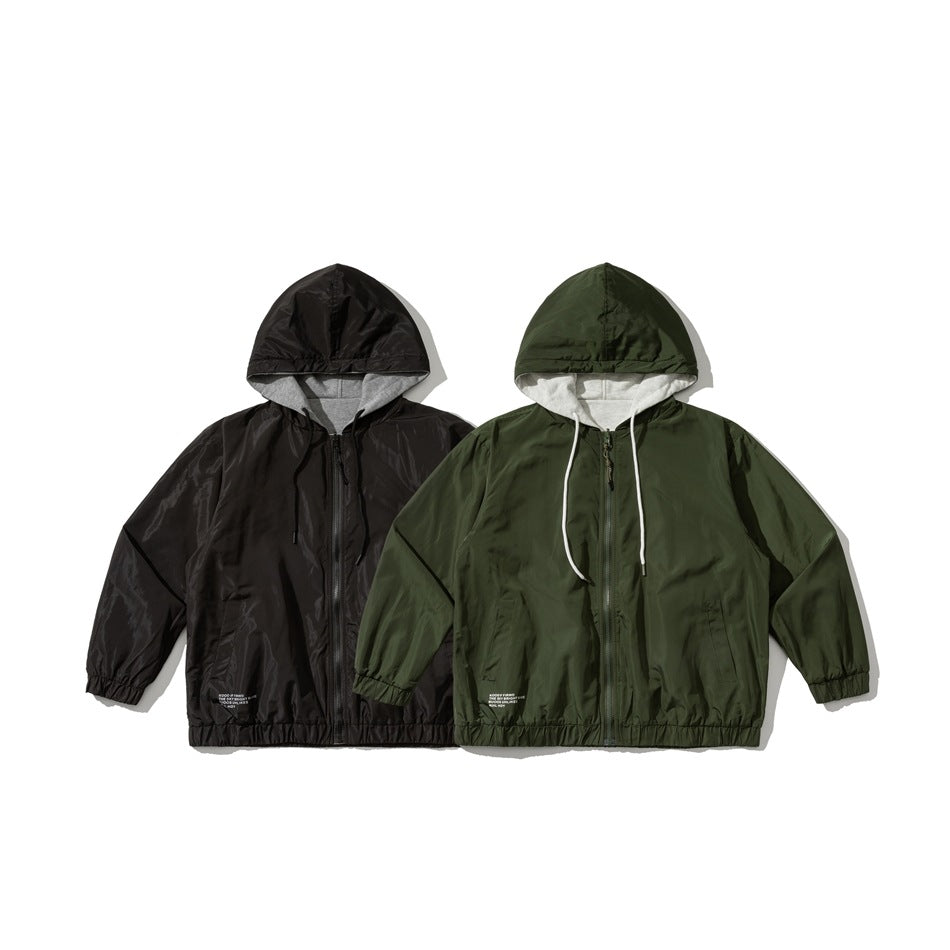 Two hooded zip jackets shown flat: one black with gray lining and one dark olive with light lining.