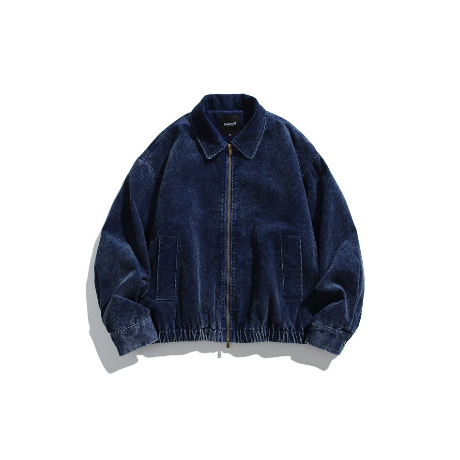 Navy blue washed corduroy zip jacket with pointed collar, front pockets and elasticated hem, flat front view