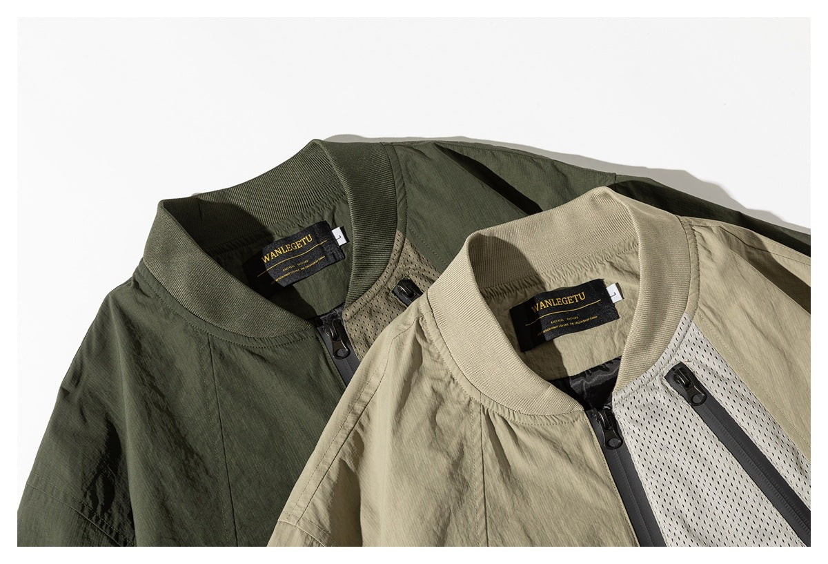 Close-up of olive and khaki zip-front jackets, showing ribbed collars, zippers and mesh chest panels.