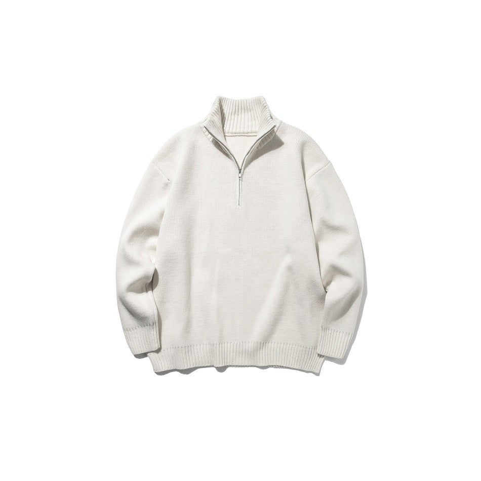 Off-white knit half-zip sweater with ribbed stand collar, dropped shoulders and ribbed cuffs, flat front view