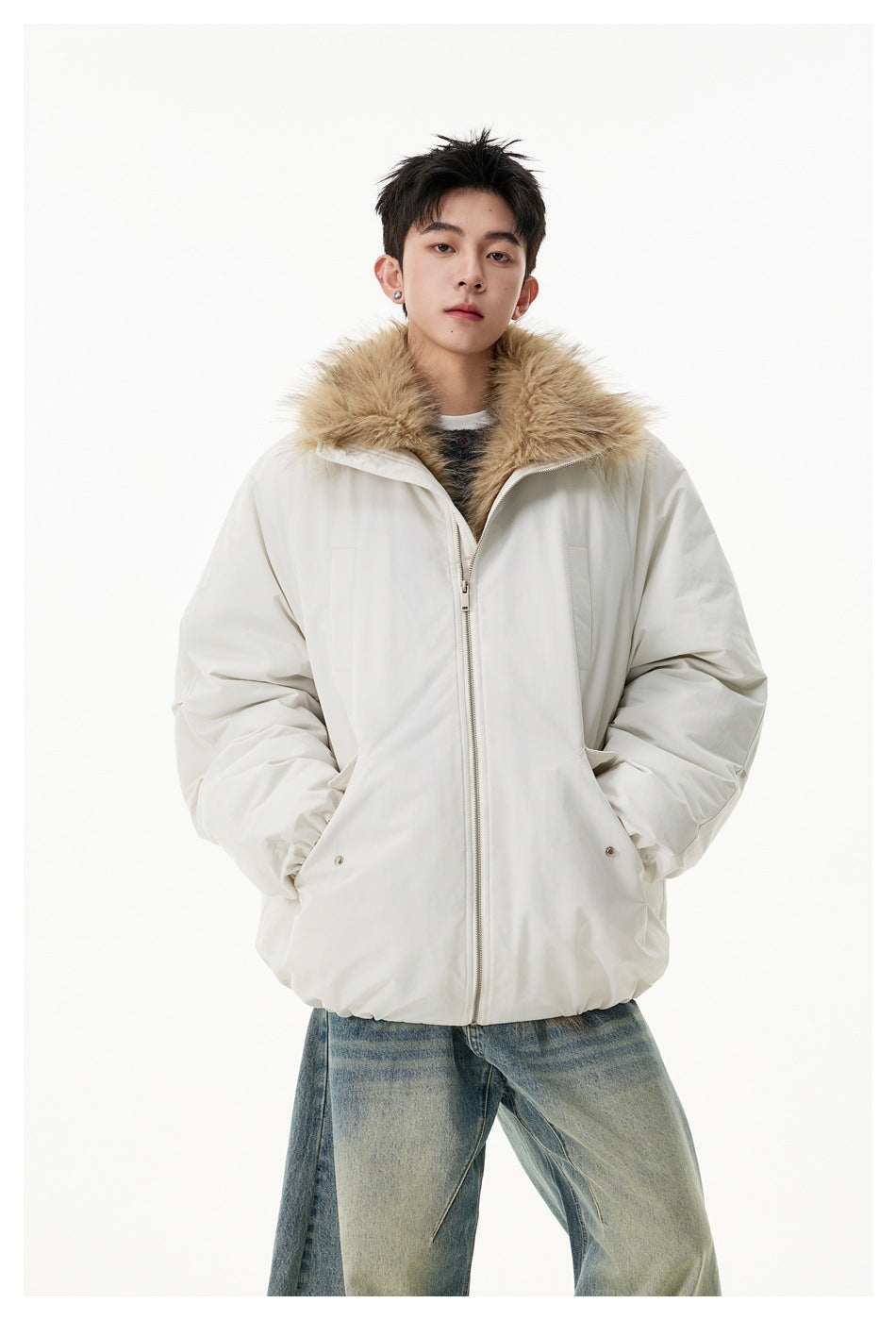 Front view of a model wearing a zipped ivory jacket with a wide tan faux-fur collar.