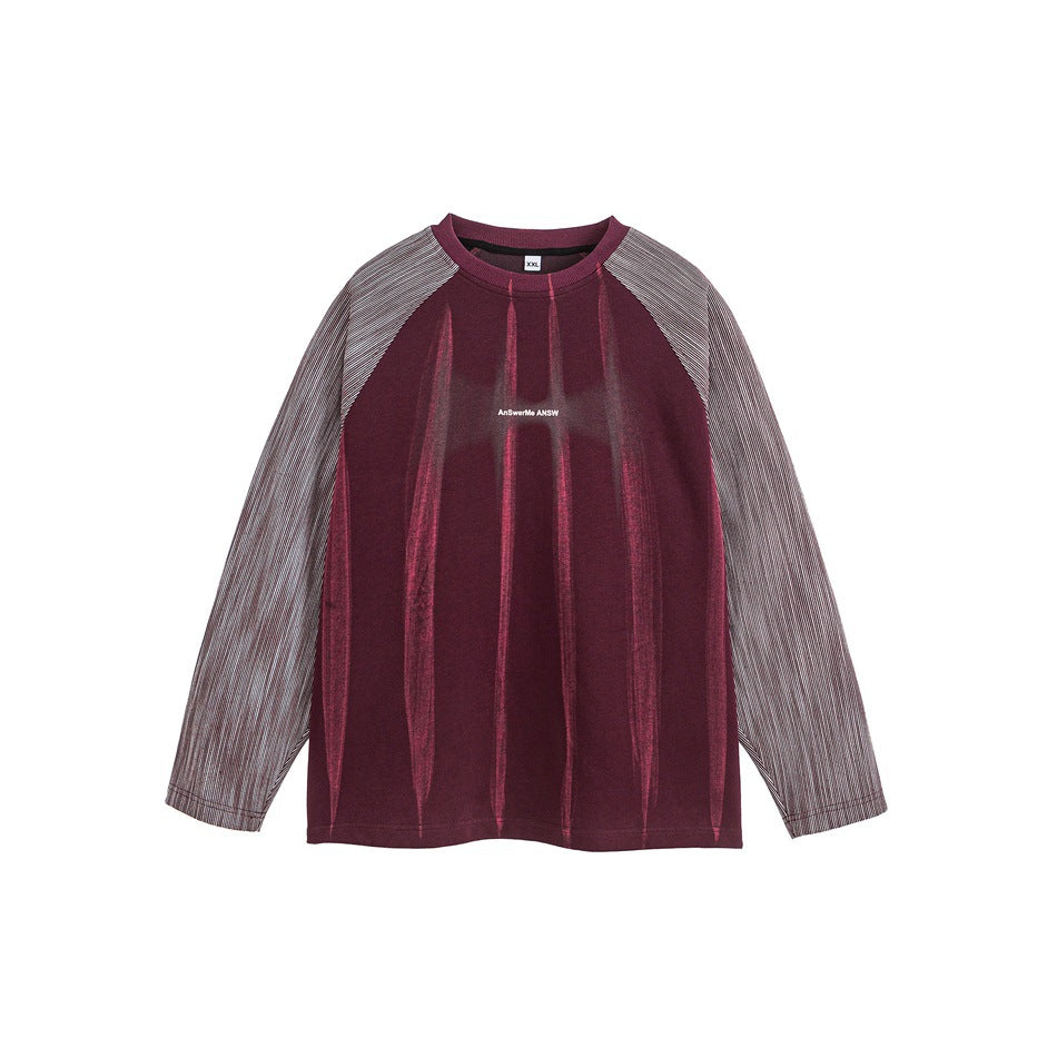 Purple raglan crew-neck sweatshirt with pink streak print and gray-pink striped sleeves, front flat view
