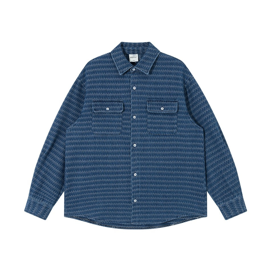 Blue zigzag-textured long-sleeve button-up shirt with two chest flap pockets, flat front view