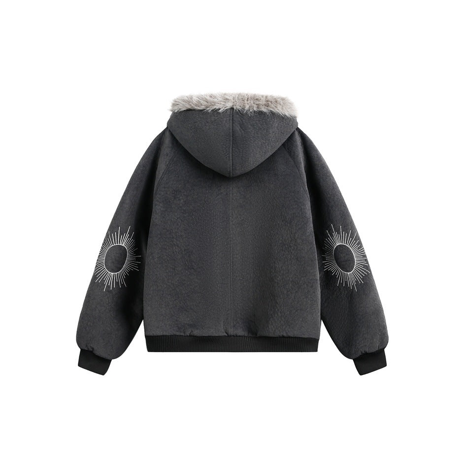 Back view of a charcoal hooded jacket with light fur trim and sunburst designs on both sleeves.