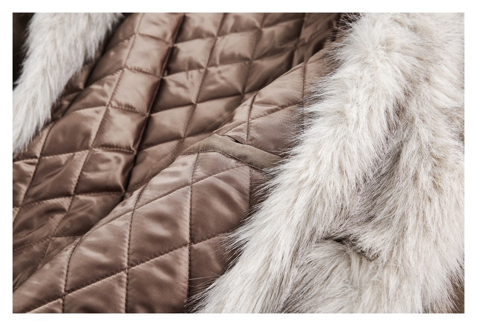 Close-up of a brown diamond-quilted garment with thick light gray fur trim.