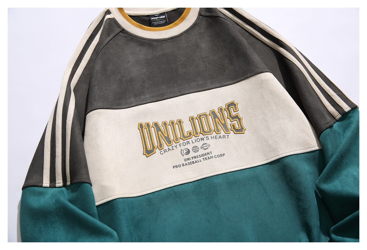 Cropped front view of a charcoal, cream, and teal sweatshirt with striped sleeves and an English chest graphic.