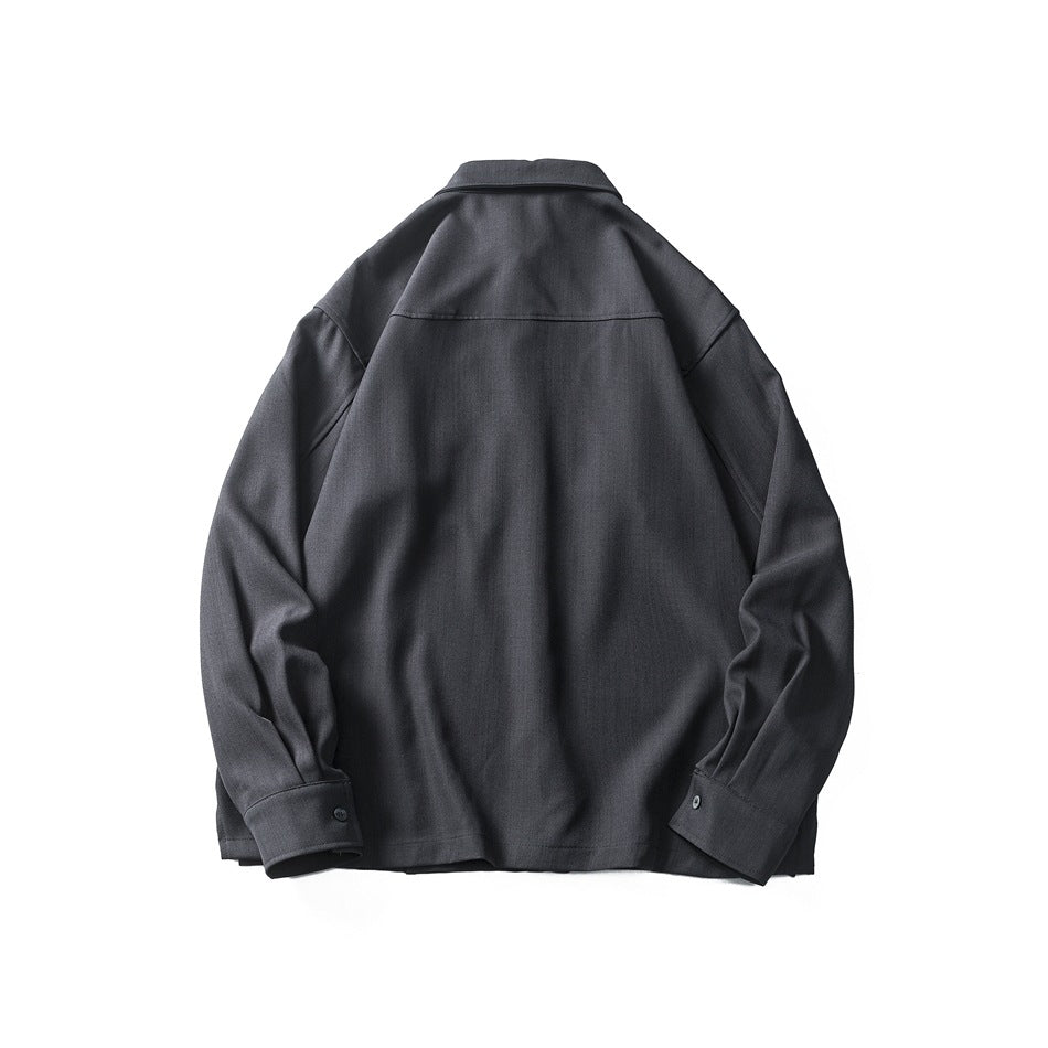 Back view of a charcoal long-sleeve shirt laid flat, showing a shoulder yoke and button cuffs.