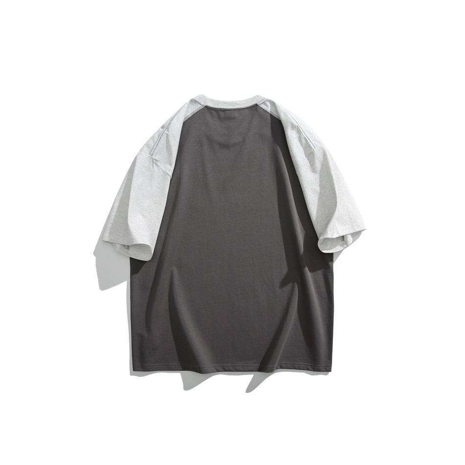 Back view of a charcoal gray T-shirt with light heather-gray raglan sleeves.