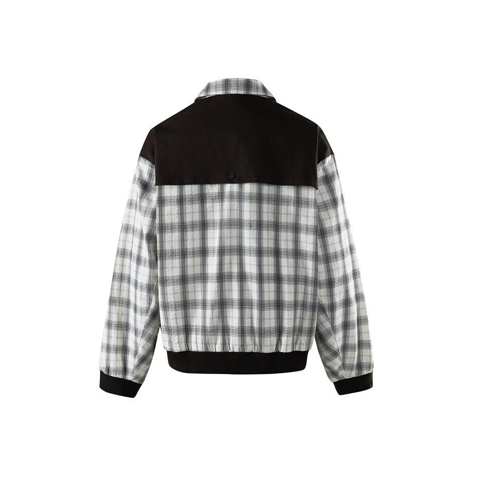 Back view of plaid jacket with black yoke, snap button, ribbed hem and cuffs