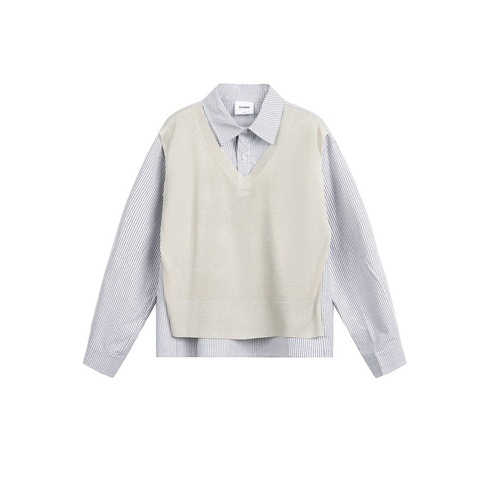 Flat-lay front of a striped collared shirt with a beige V-neck knit vest-style panel and a longer shirt hem
