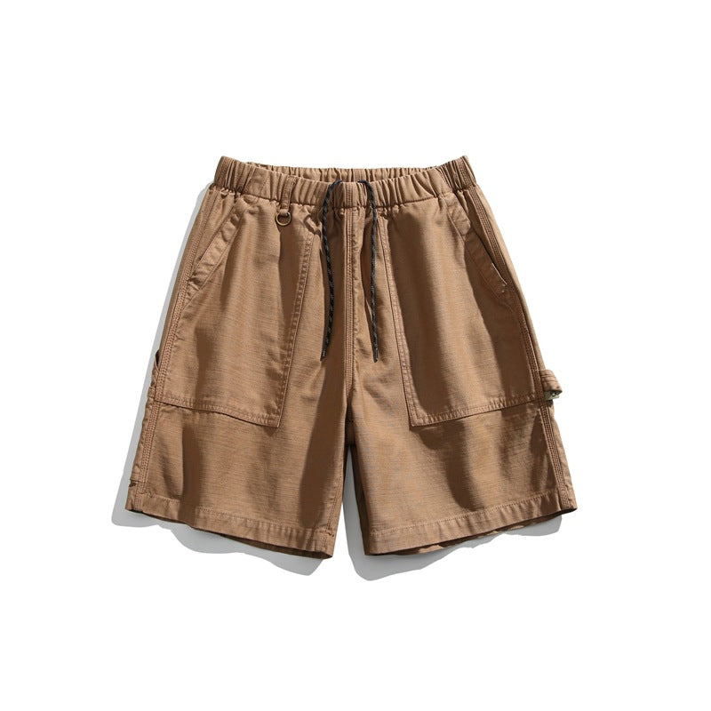 Khaki brown men's drawstring shorts with large front patch pockets, front view on white background