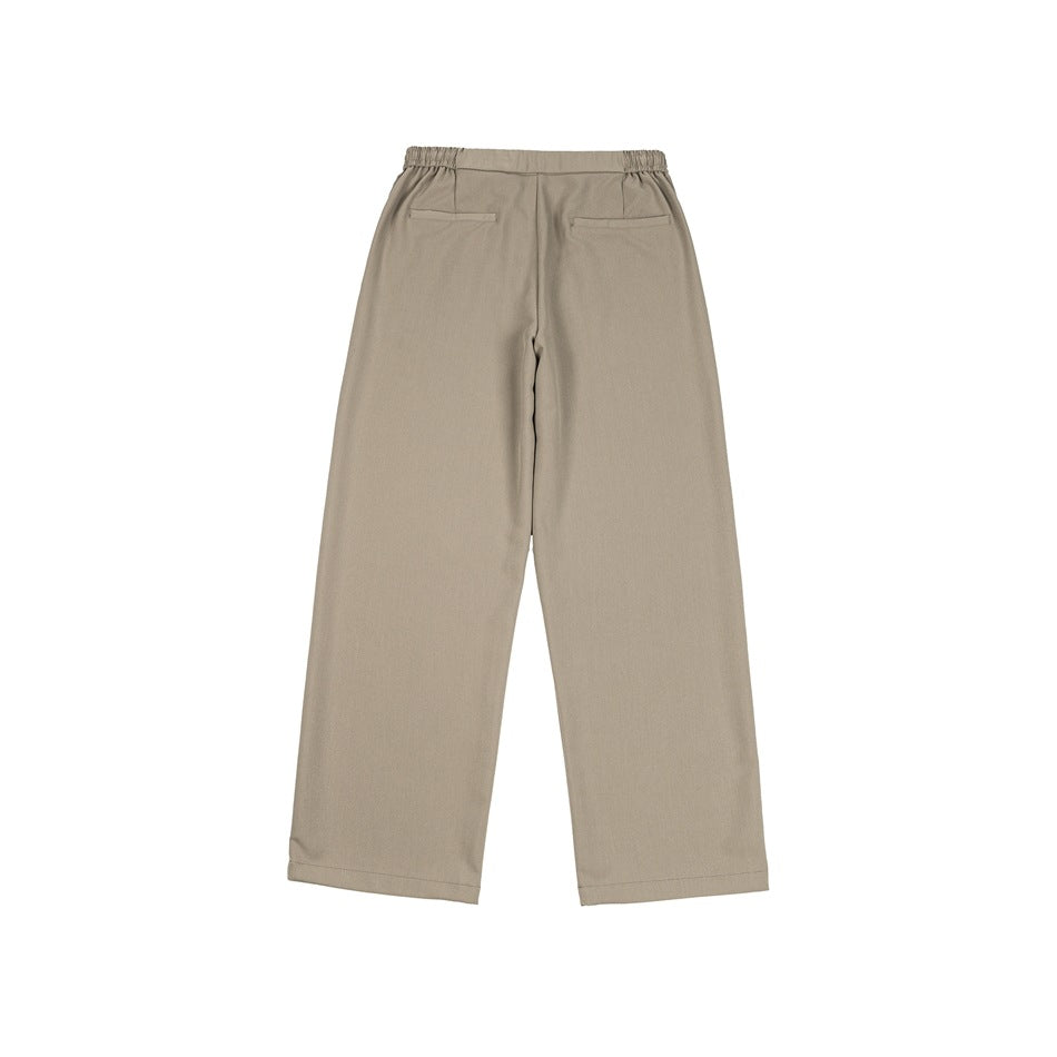 Back view of taupe wide-leg trousers with an elasticated waistband and two welt pockets.