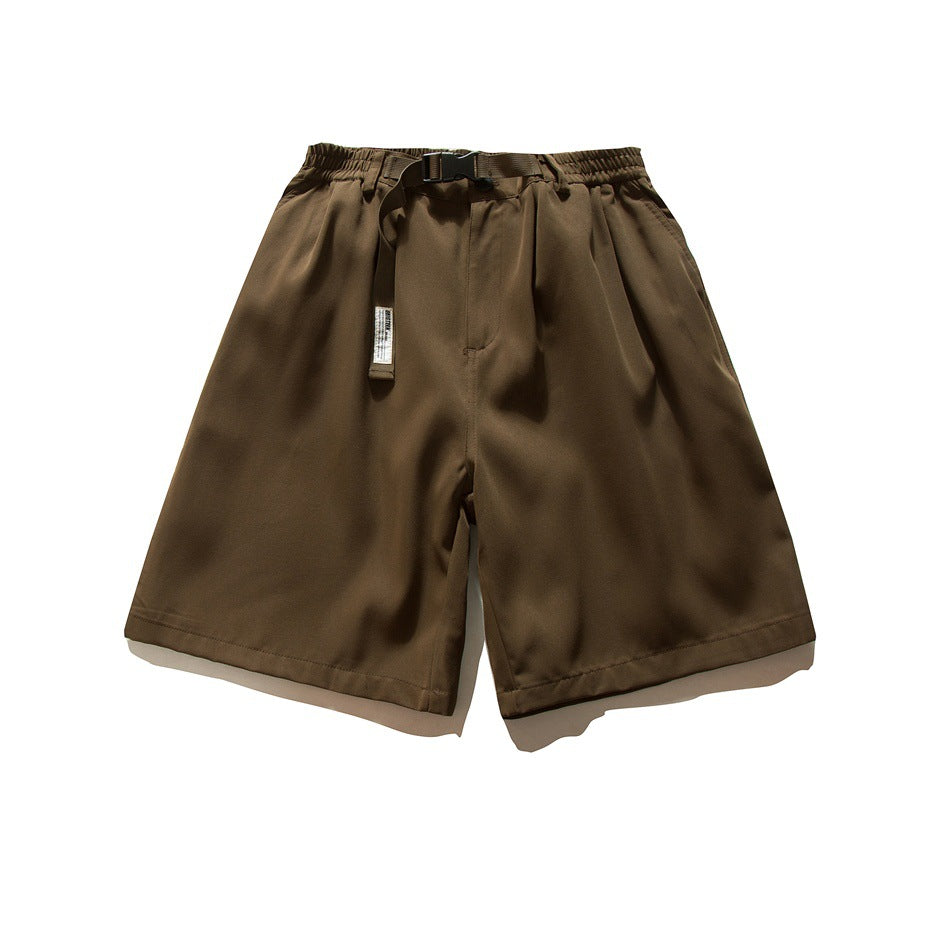 Brown knee-length wide-leg shorts flat lay with elastic waist, buckle belt, front pleats and side pockets