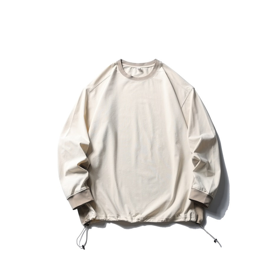 Sand crewneck pullover with taupe ribbed collar and cuffs and drawcord hem, flat lay