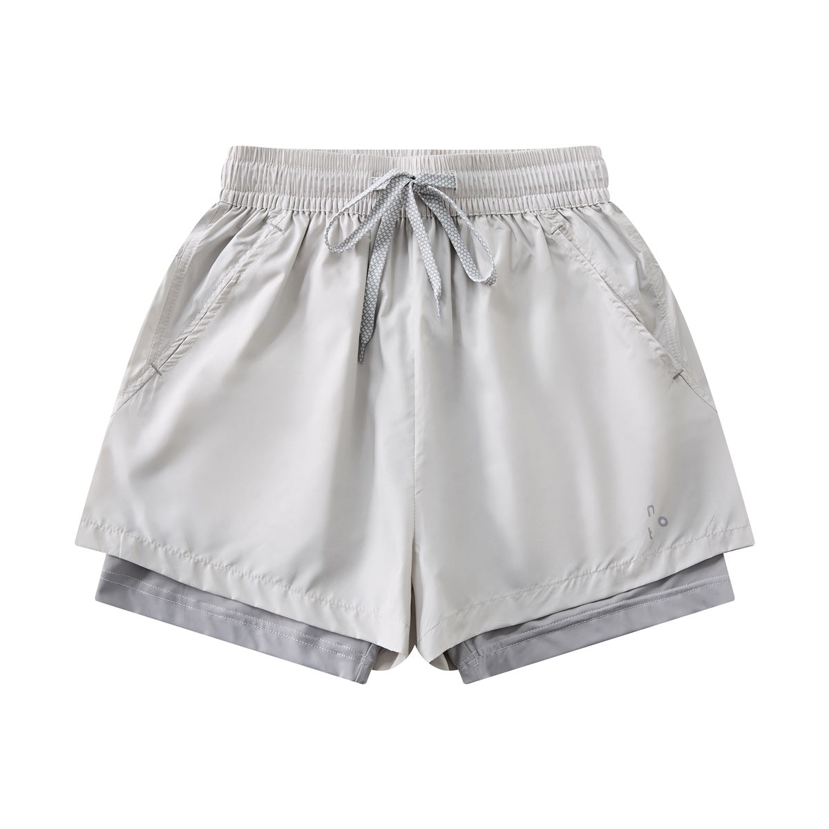 Light gray women's two-layer shorts with drawstring waist, side pockets and darker gray inner layer, front flat lay